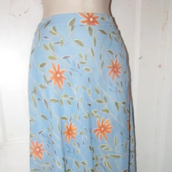 NWT, Moschino, size 46 IT/12 US, periwinkle, midi A-line skirt with stylized orange & green floral print